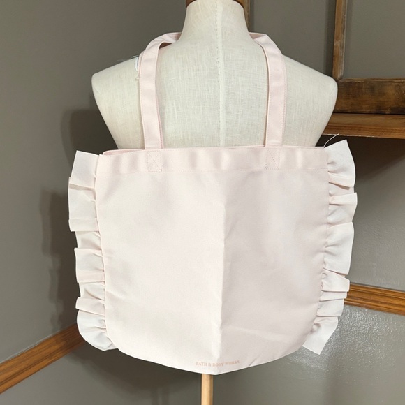 Bath & Body Works Handbags - Bath & Body Works pale Pink Ruffled Tote Bag